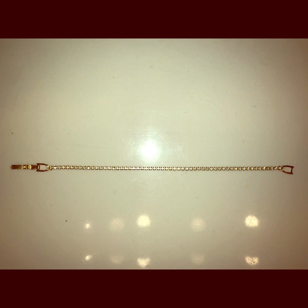 3 for $10 7” cubic zirconia gold bracelet. Very sparkly